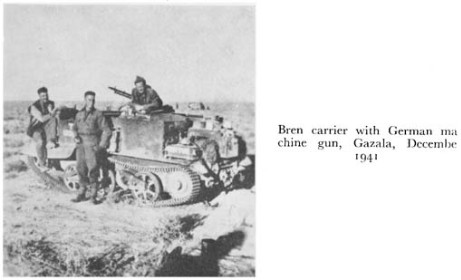 Black and white photograph of soldiers with a tank